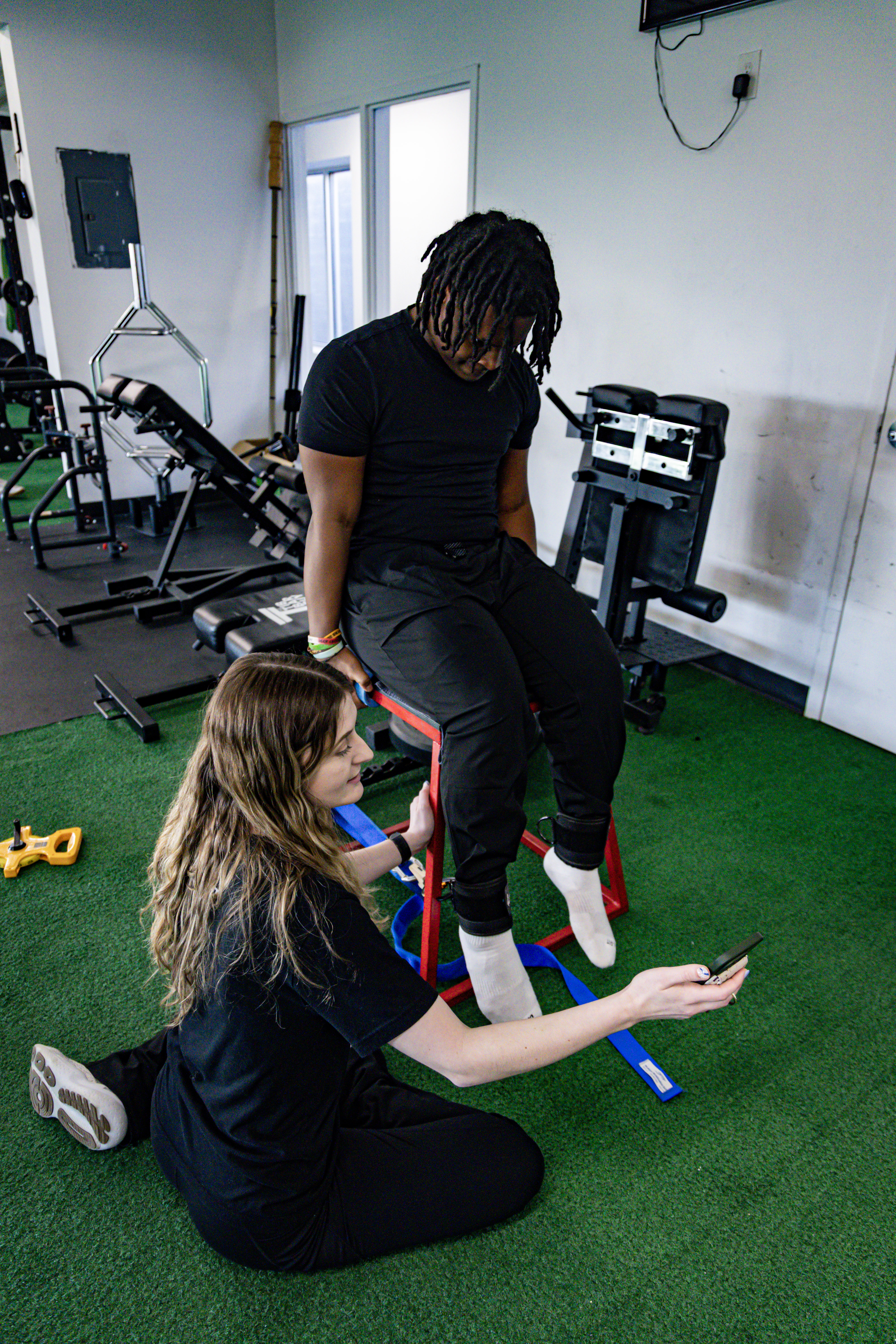 Therapist working with athlete